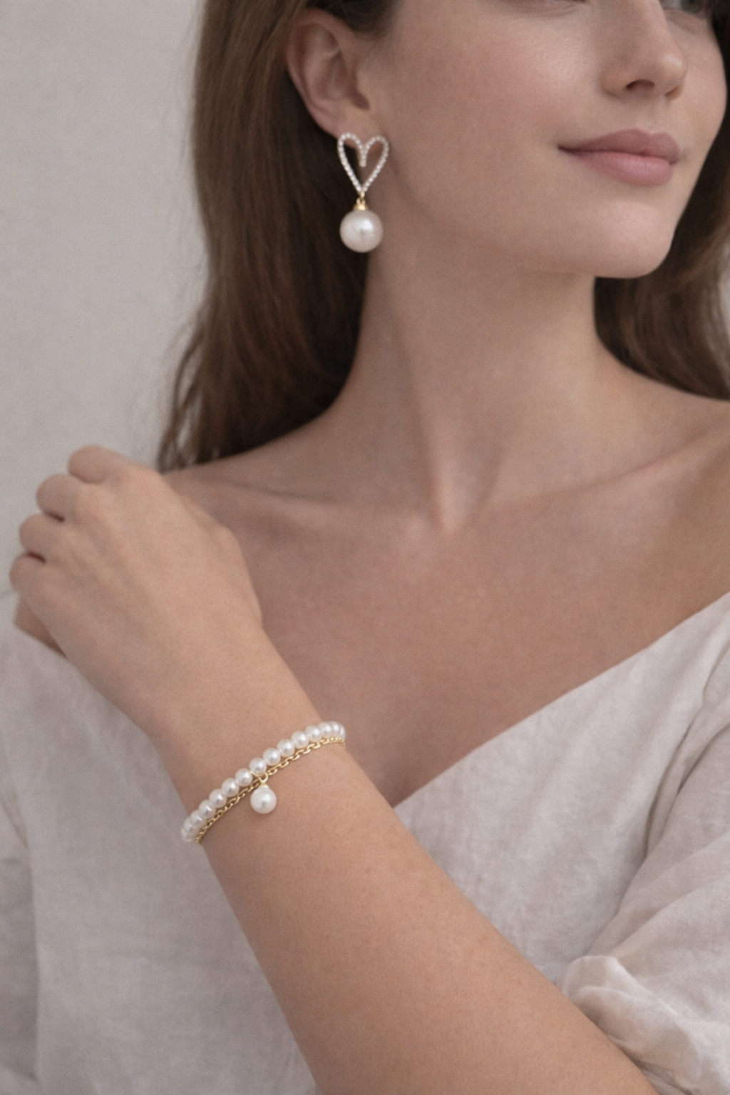 Faux pearl earrings and bracelet set